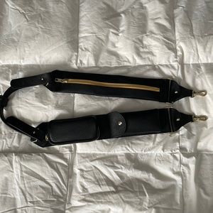 Bandolier utility strap in black and gold.